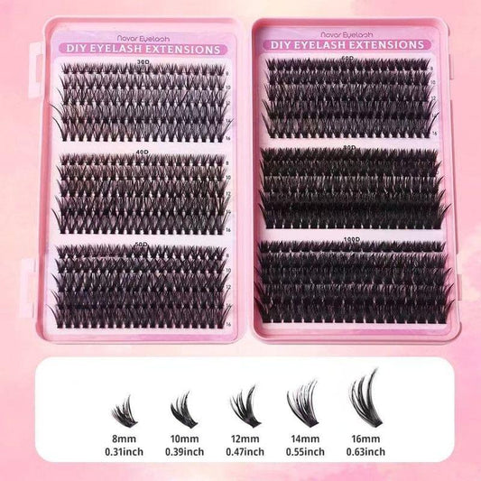 False eyelash extension cluster set on pink trays with labeled length rows