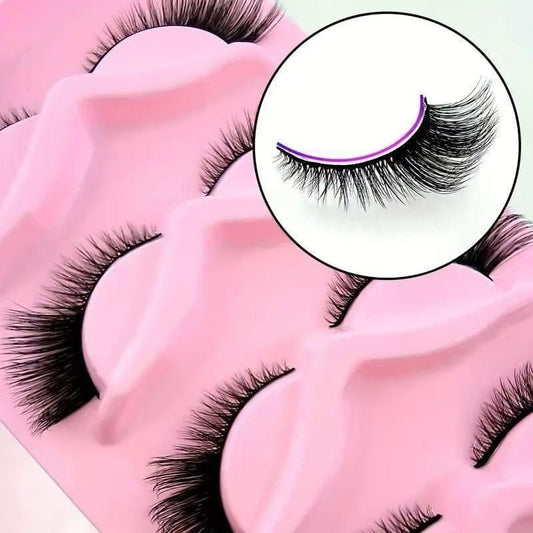 False eyelash set close-up: long thick black lashes with extended cat-eye tips