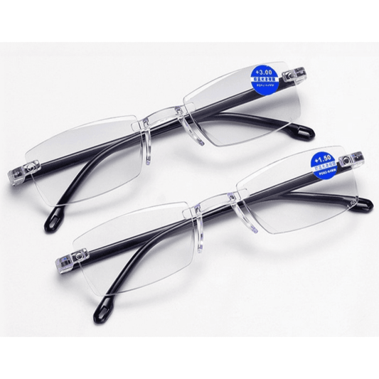 Two navy reading glasses with clear lenses and curved temples, laid on a flat surface