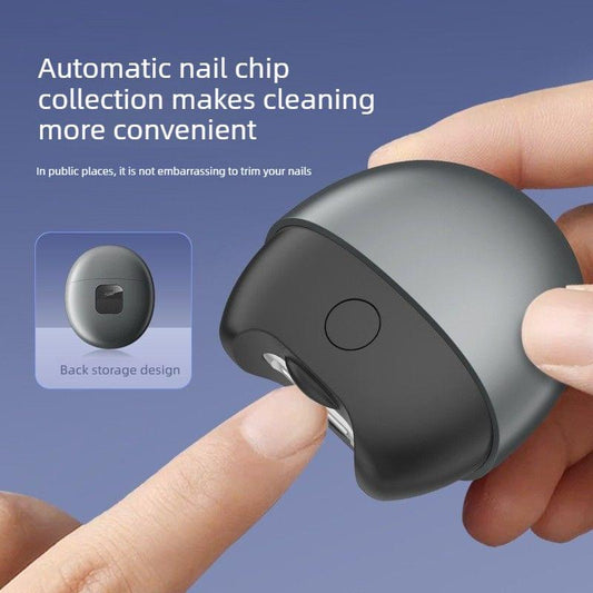 Handheld grey electric nail clipper with black grip and open trimming channel