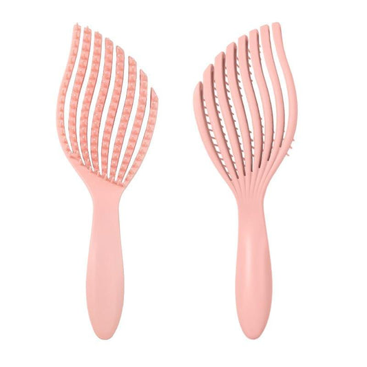 Pink detangling hair brush with wide-tooth flex pins, mermaid-style shape