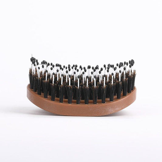 Circular mosquito coil comb with brown base and dense rows of black bristles