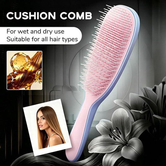 Silicone cushion hair massage brush with pink bristles and light blue handle