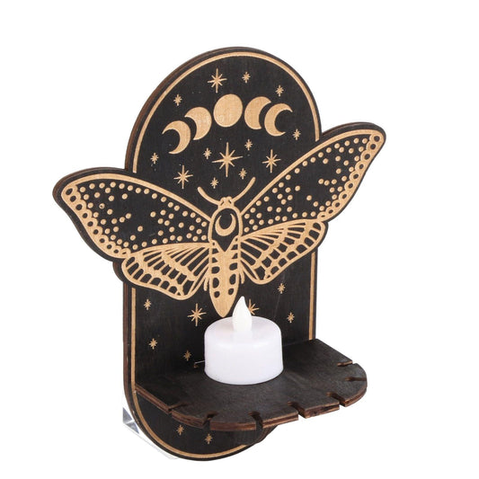 Butterfly wooden candle holder with starry moon design and white candle on base