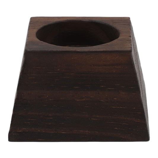 Trapezoid wooden candle holder with round recessed opening on top, dark brown
