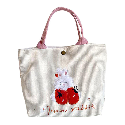 Small tote handbag in white fabric with pink handles and rabbit graphic on front