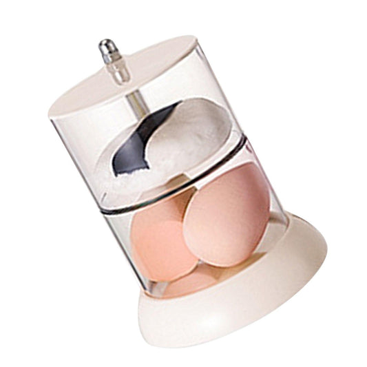 Two-tier rotating powder puff organizer, clear cylinder with white base and puffs inside