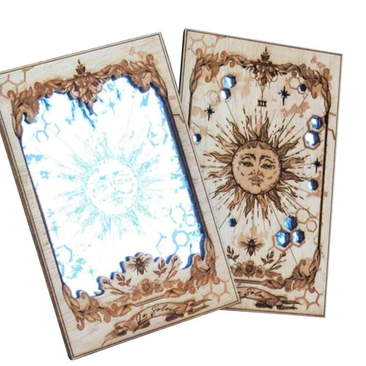 Wood-framed tarot card mirror with sun face, stars, and hexagon accents