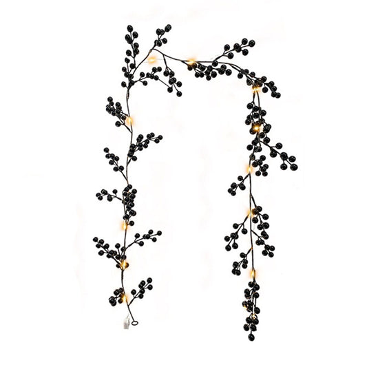 Black berry rattan garland with small berry bead clusters and golden accents, hanging loop
