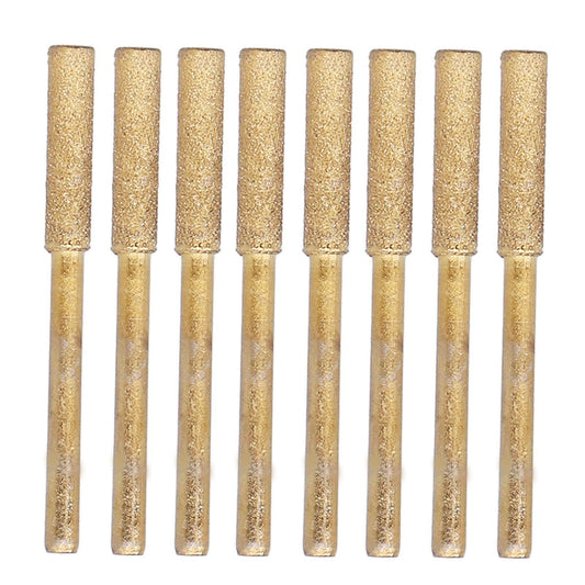 Metal polishing tool set with eight gold abrasive cylinders on slim shanks