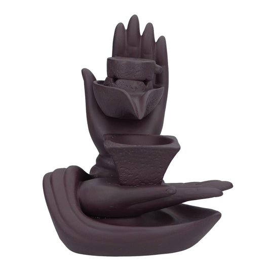 Ceramic incense burner shaped like raised hands holding a small bowl dish