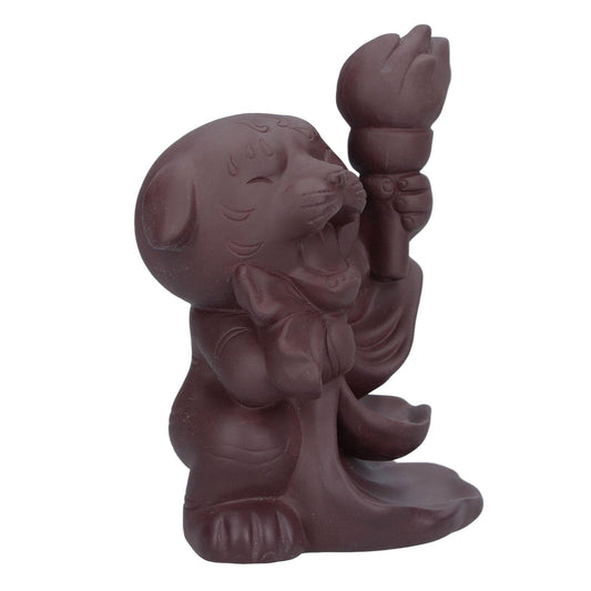 Dark brown incense backflow burner figurine, kneeling dog holding a tall stem