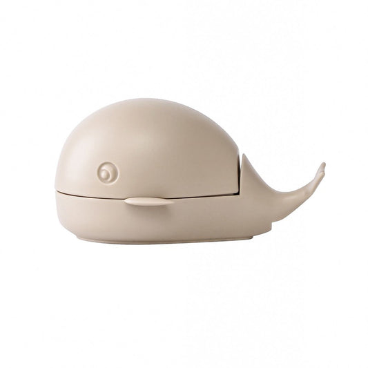 Whale-shaped shoe cleaning brush with soft bristles, beige portable design.