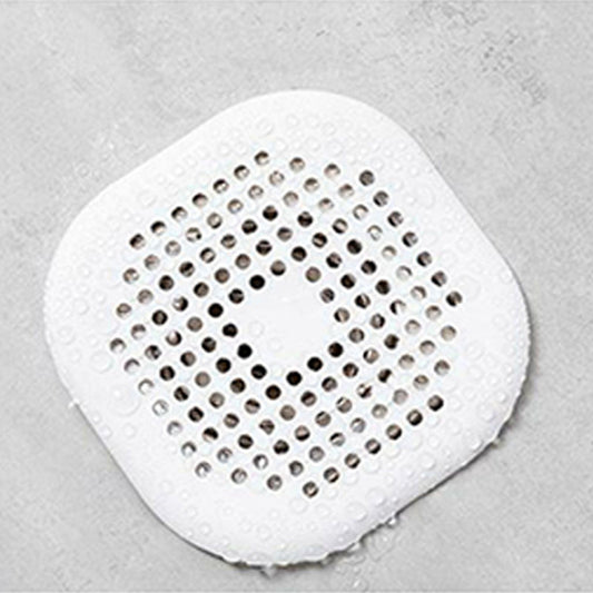 Round white floor drain hair catcher pad with dense perforation