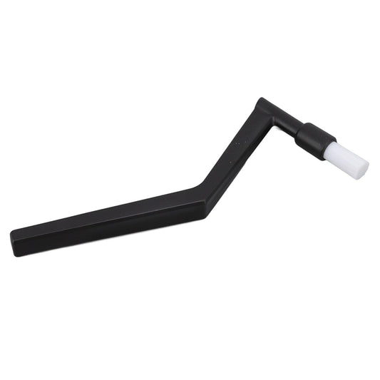 Coffee machine cleaning brush with long shank and white nylon bristles, black handle.
