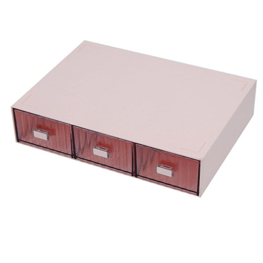 Three-drawer plastic desk organizer with pink striped drawers and clear fronts