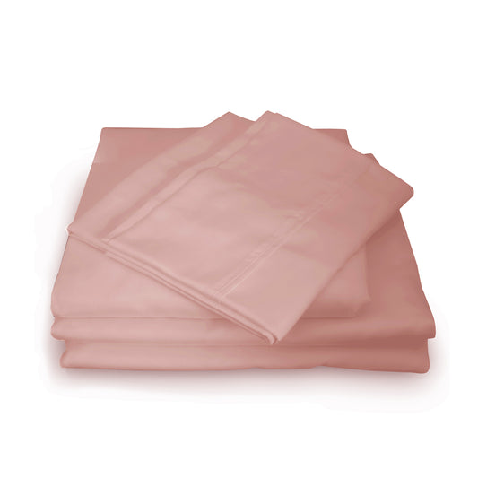 Blush pink king sheet set with coordinating pillowcases, neatly folded.