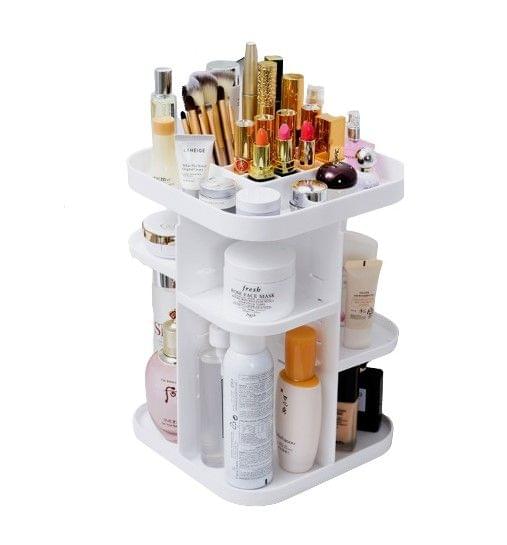 White rotating makeup organizer with stacked tiers and central pivot base for cosmetics