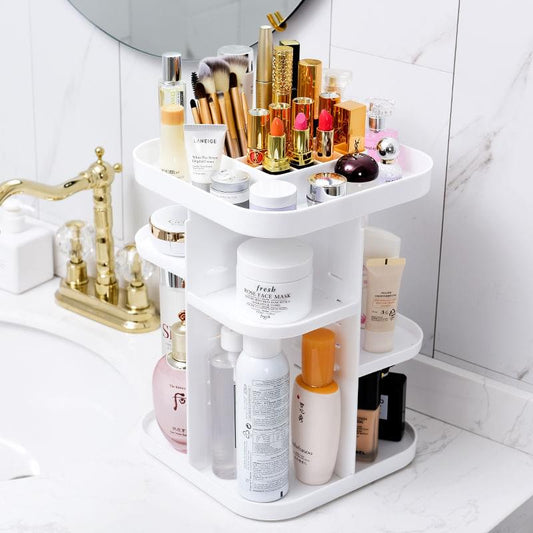White rotating makeup organizer with open tiers holding bottles, lipsticks, and brushes