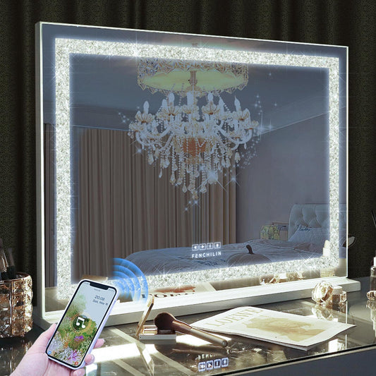 LED vanity mirror with bright illuminated frame on a tabletop, reflecting a bedroom scene