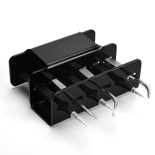 Black eyelash extension tool stand with four applicator holders and rests