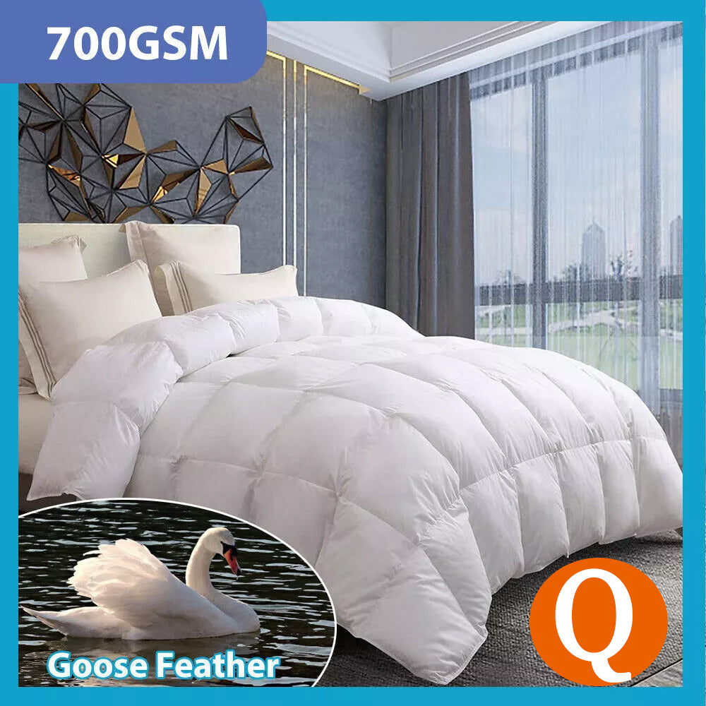 White quilt with 700 GSM fill, puffy baffle design on a bed