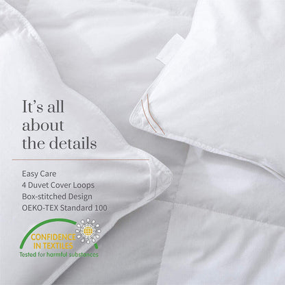 White duvet quilt with box-stitched seams and close-up fabric quilting detail