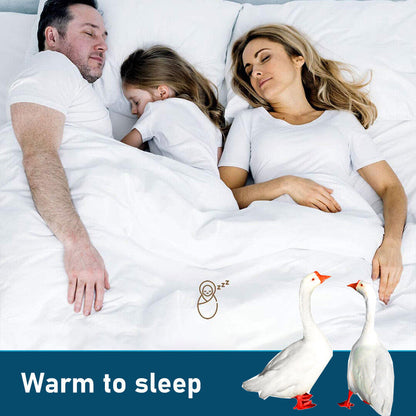 White duvet quilt on a bed beside sleeping couple, quilted fill texture visible