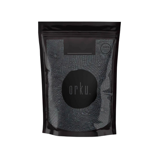Black activated carbon powder pouch with Orku logo, sealed for water filtration use
