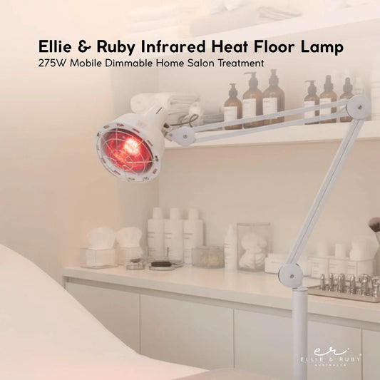 White infrared heat floor lamp with angled arm, round reflector head, and caster feet