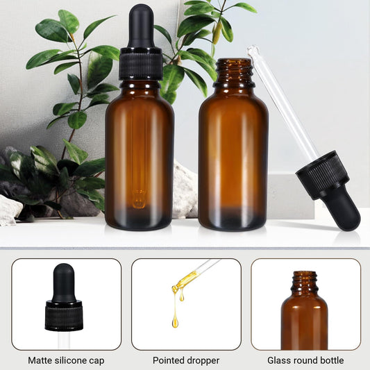 Amber glass dropper bottles with black caps and pointed droppers