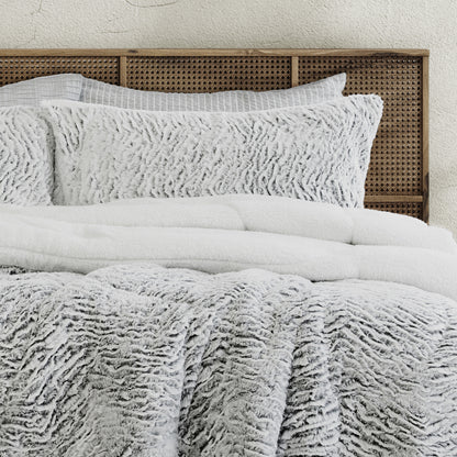 Light gray faux fur sherpa comforter set with two matching shams, bed view