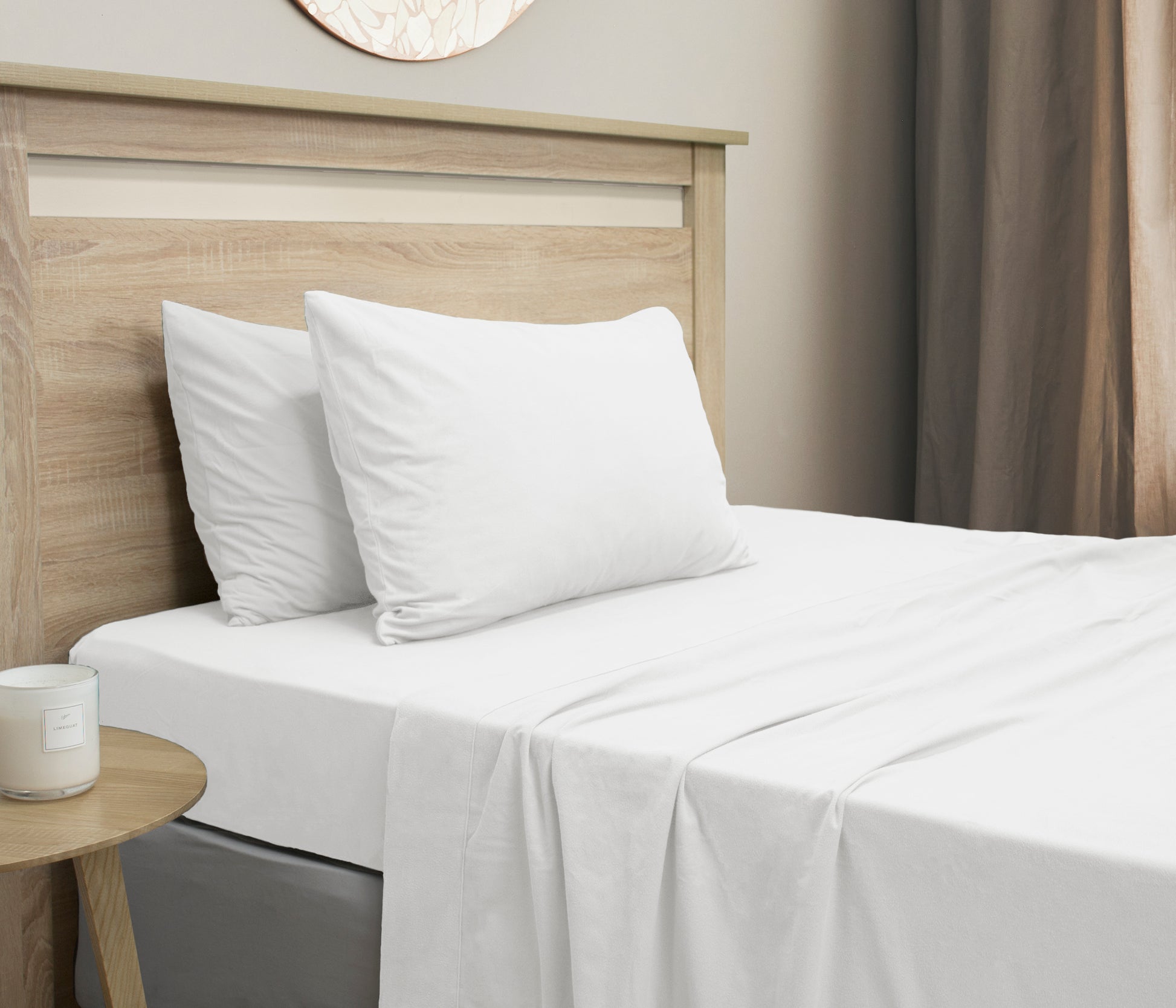 Micro flannel sheet set on single bed with two white pillowcases and flat sheet