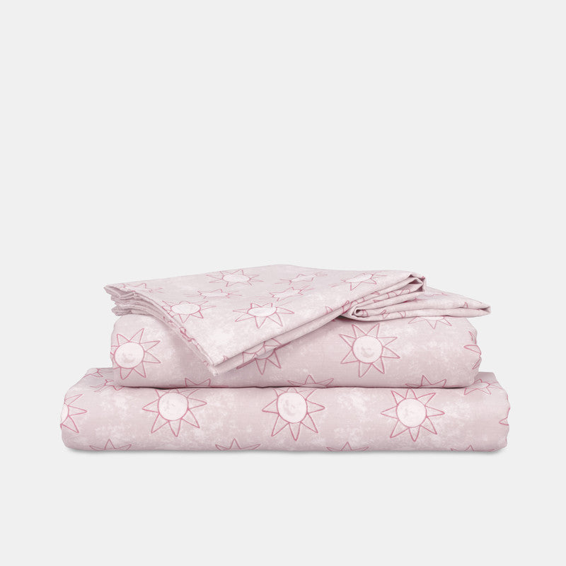 Single sheet set folded stack with pale pink star print