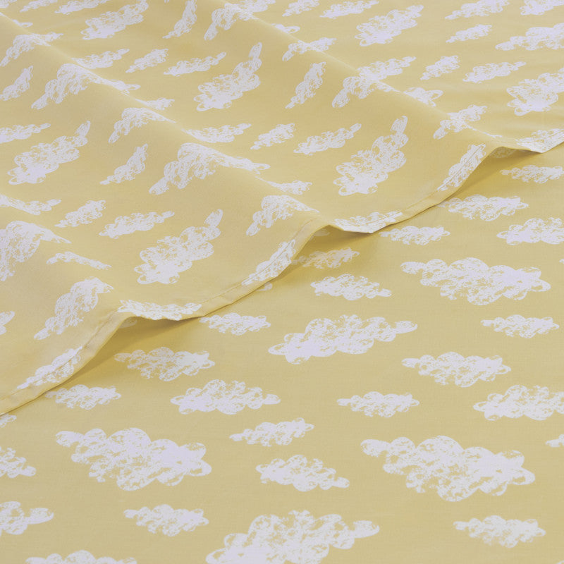 Cloud-pattern bed sheet, yellow with white cloud prints and soft draped folds