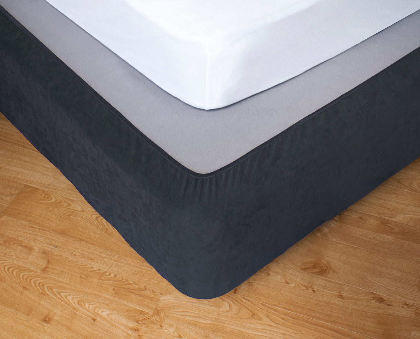 Double stretch bed valance in dark gray with gathered skirt edge
