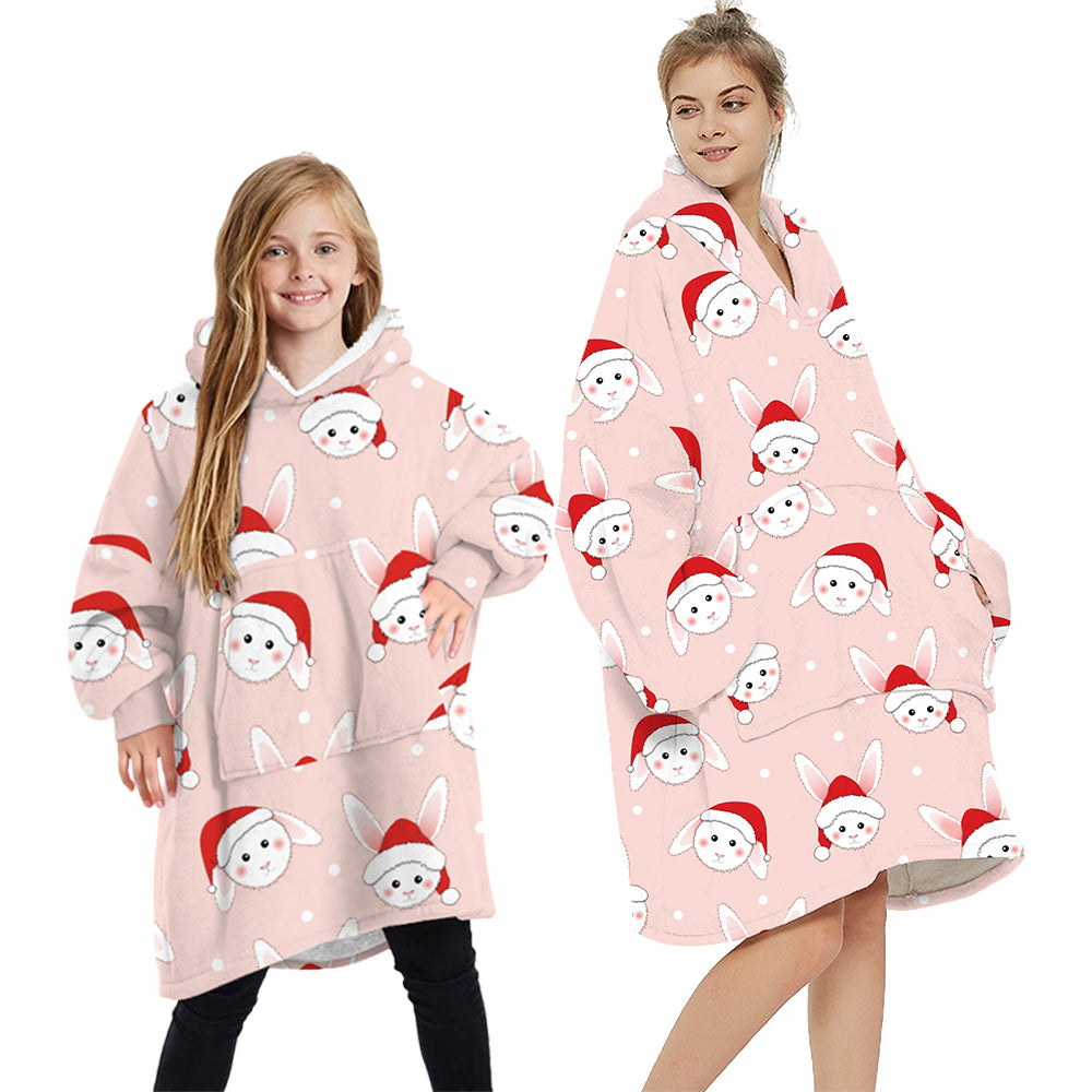 Oversized plush pullover hoodie blanket in light pink with bunny print
