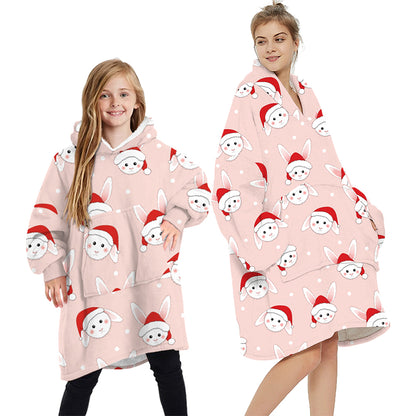 Oversized plush pullover hoodie blanket in light pink with bunny print