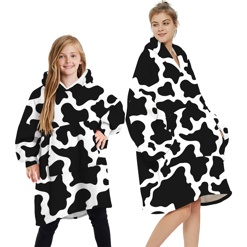 Cow-print plush pullover hoodie with hood, long sleeves, and kangaroo pocket
