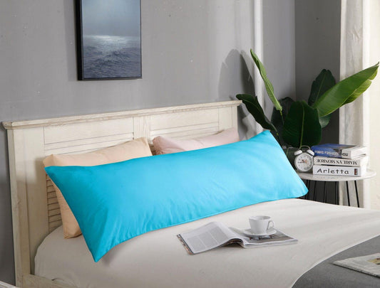 Light blue body pillowcase with smooth fabric, folded on a bed