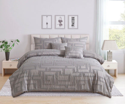 Queen-size grey jacquard bedding set with patterned quilt, pillows, and shams