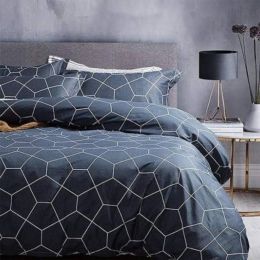 Duvet quilt cover with dark blue hexagon grid pattern and coordinated pillowcase