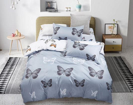 Butterfly king-size duvet set on blue with white butterflies; includes matching pillows