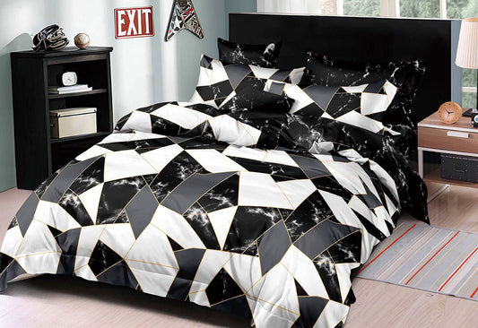 Super king duvet cover set with black and white geometric quilt pattern, bed shown