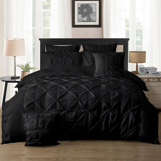 Black king duvet quilt cover set with diamond pintucks, visible on bed