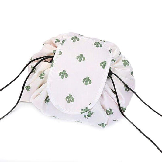 White drawstring makeup pouch with green cactus-style print and rounded front flap