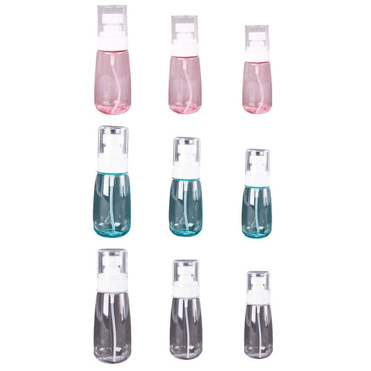 Refillable travel emulsion dispenser bottles, assorted pink and teal clear press pumps