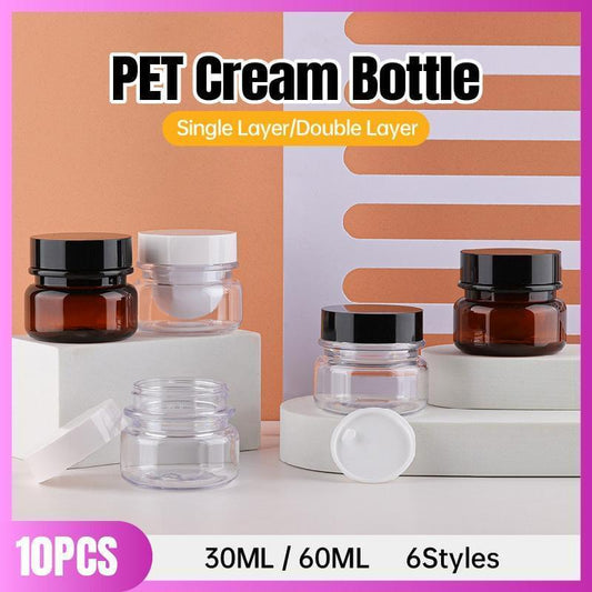 Set of refillable PET cosmetic cream bottles with black and amber lids, assorted sizes