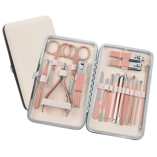 Rose gold stainless steel manicure set open in travel case with nail tools
