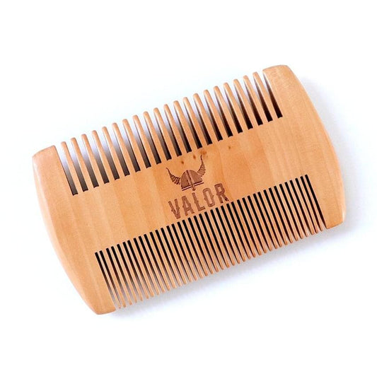 Natural wooden beard comb with Valor logo and wide teeth